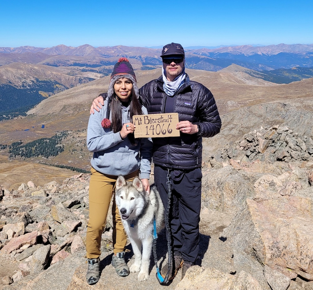 Nez and Locke with dog on Mt. Bierstadt