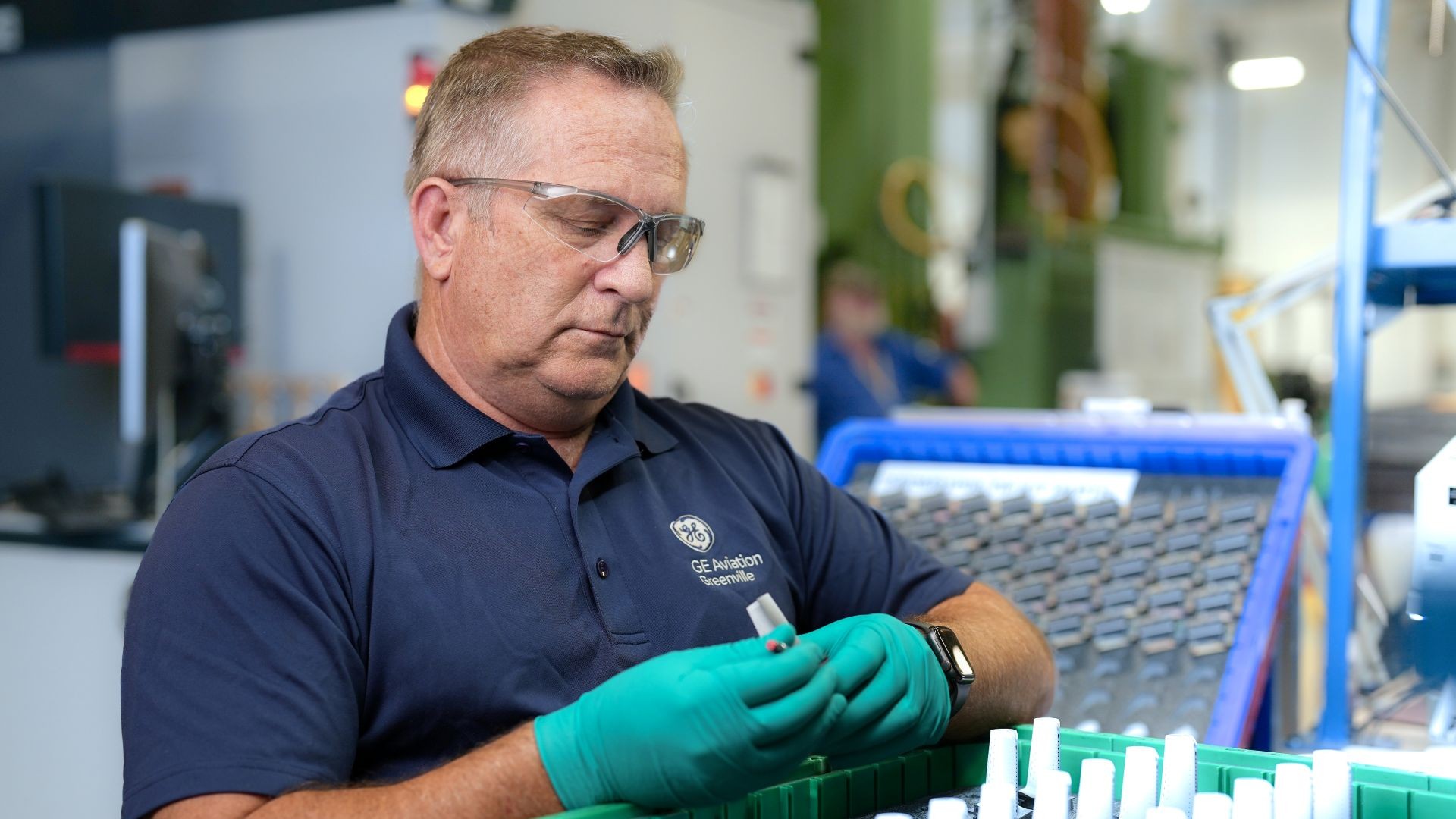 GE Aerospace employee working on new CFM56 HPT blade